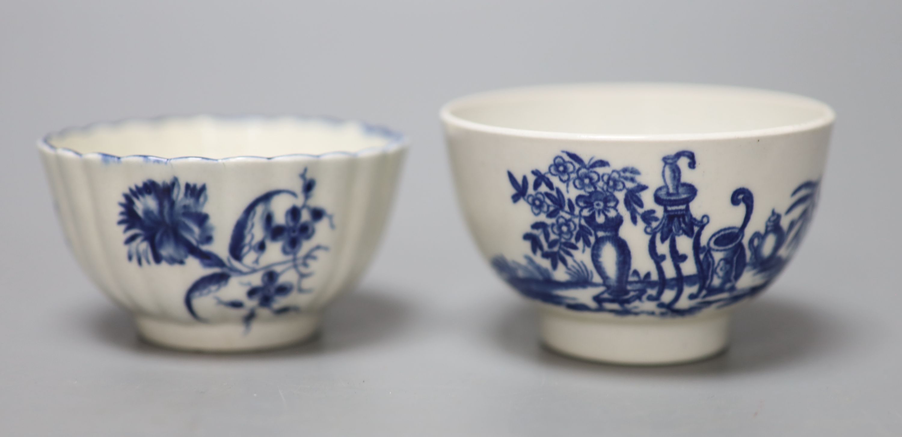 An 18th century Worcester teabowl and saucer Gilliflower pattern and another with mother and child pattern, all with crescent marks